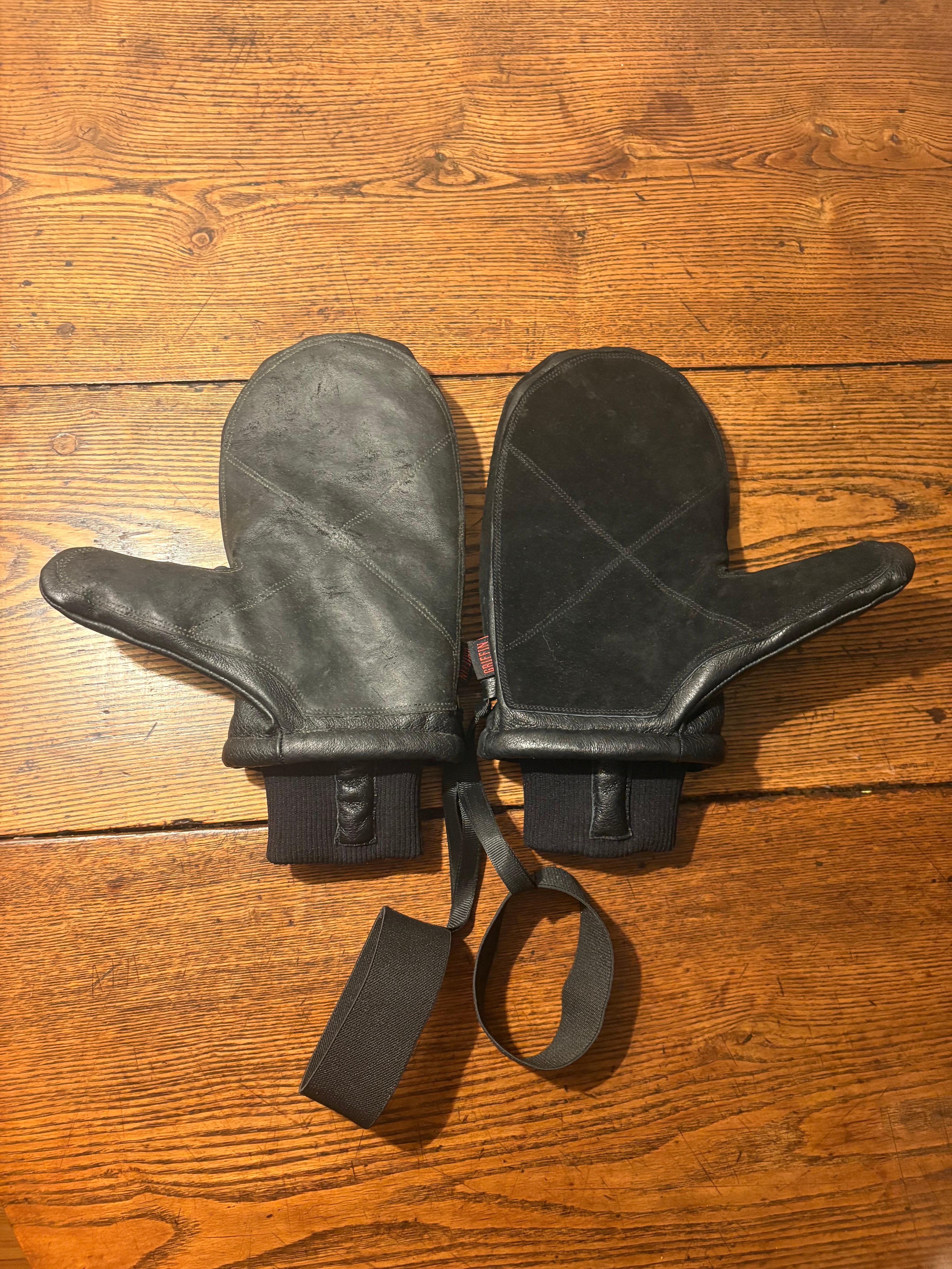 Waxed leather mittens — water‑resistant sheen