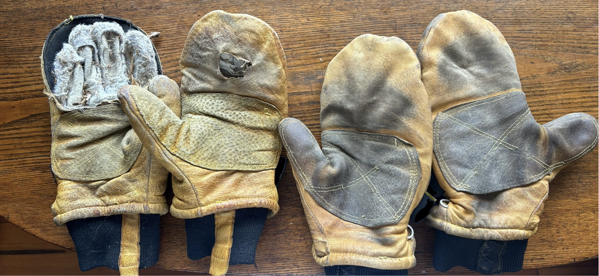 Competitor mittens after one season on a tow rope, showing shredded palms